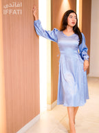 Sky Mist – Light Blue Satin Midi Dress with Side Tie & Long Sleeves for Elegant Day to Night Looks